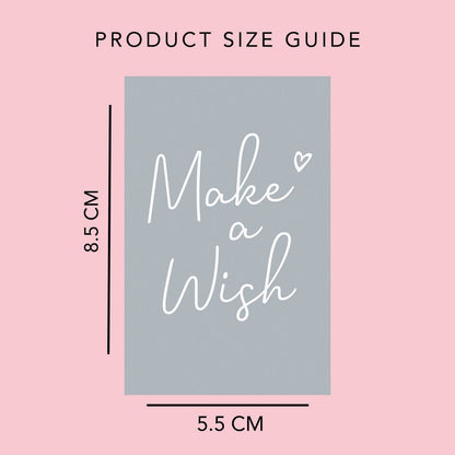 Product size guide with 'Make a Wish' text on a pink background