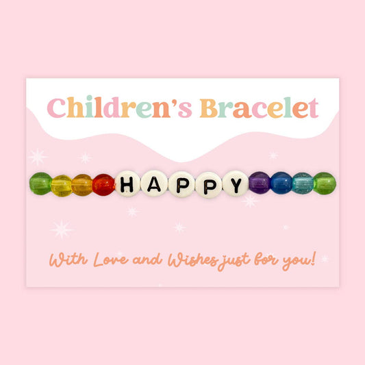 Children's bracelet with colorful beads spelling 'HAPPY' on a pink background