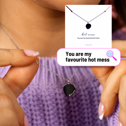 Necklace with a gold pendant held by hands, with a close-up of the pendant and text 'You are my favourite hot mess' on a card.