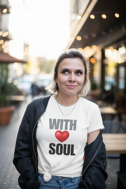 Woman wearing a white t-shirt with text and a heart symbol in an outdoor setting