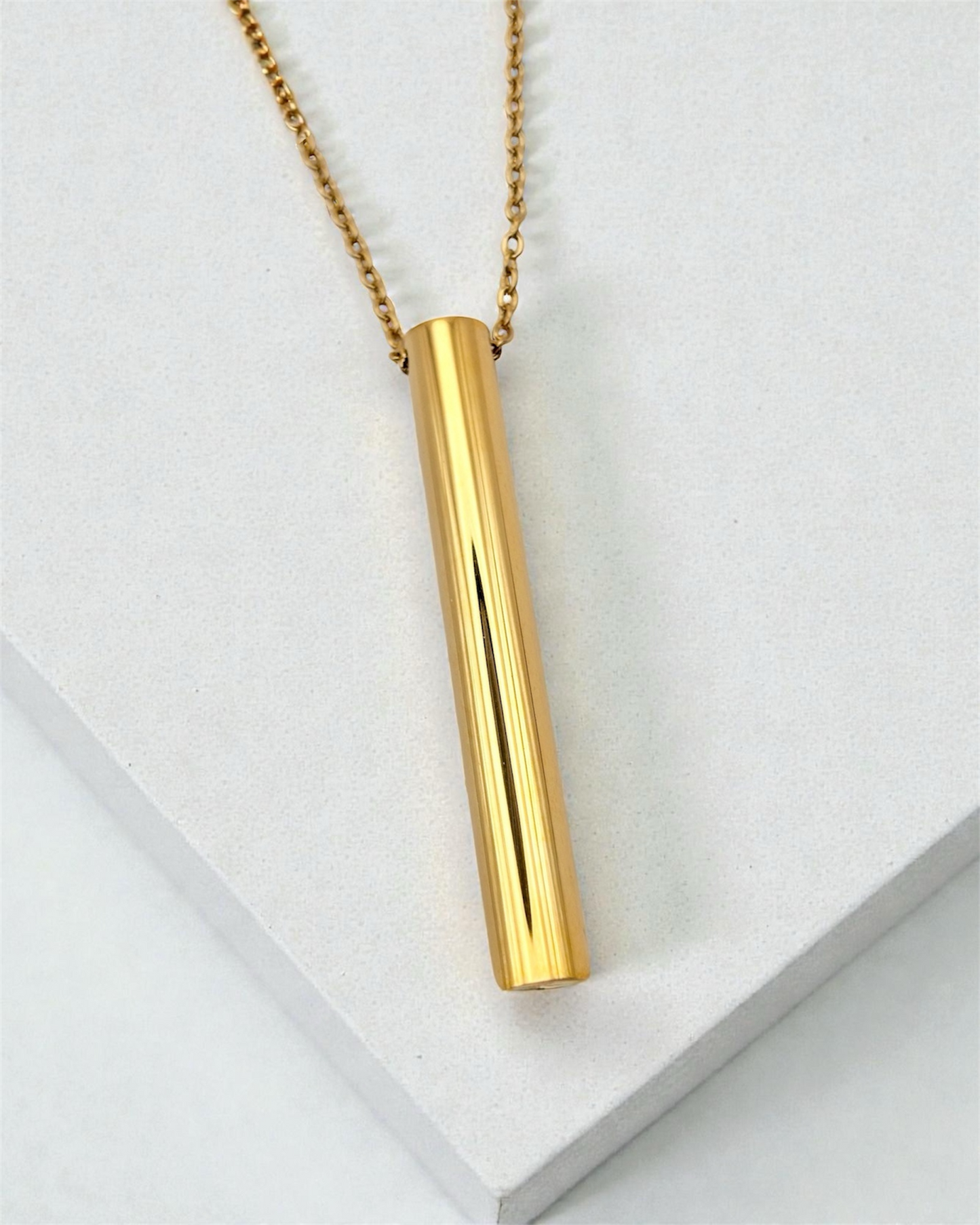 KALMii gold anxiety necklace on a white background