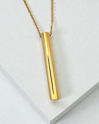 KALMii gold anxiety necklace on a white background