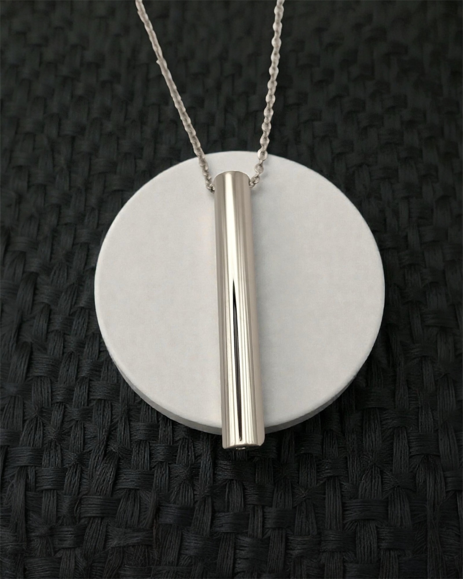 KALMii Anxiety Necklace in silver on white platform