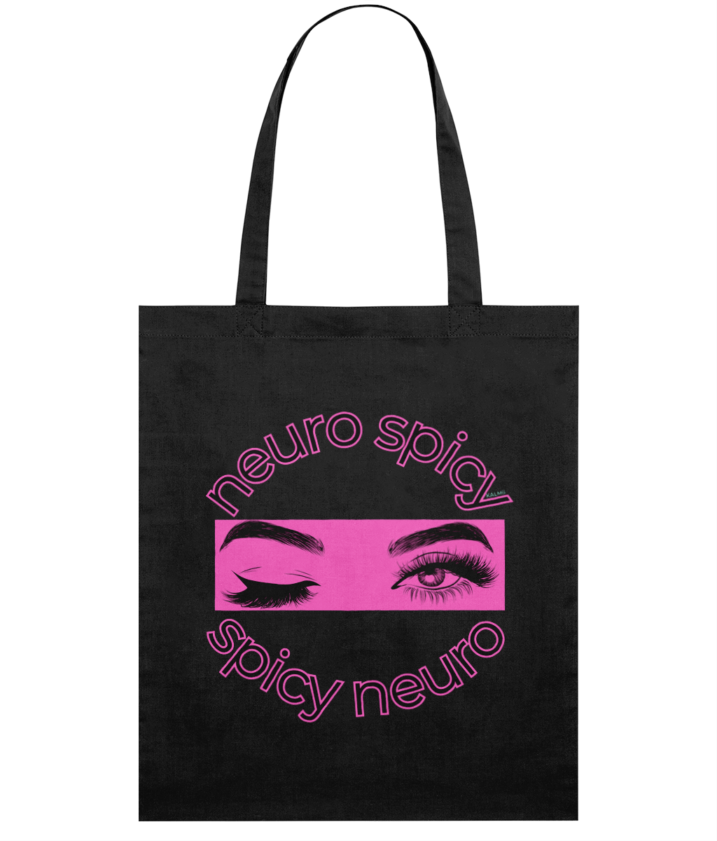 Black tote bag with pink 'neuro spicy' and 'spicy neuro' text and eye graphic on a white background