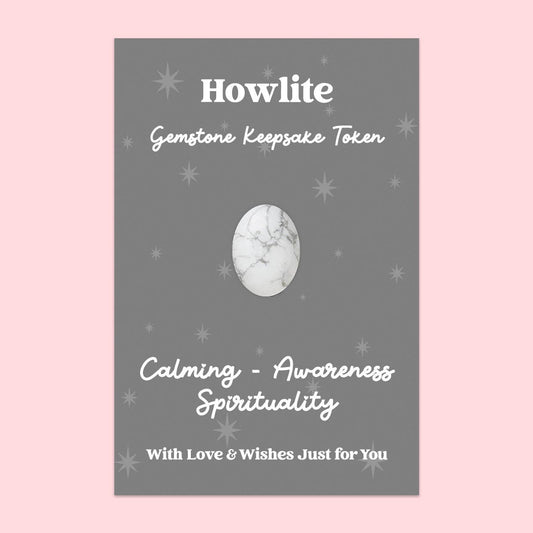 Howlite gemstone keepsake token packaging with text on a pink background