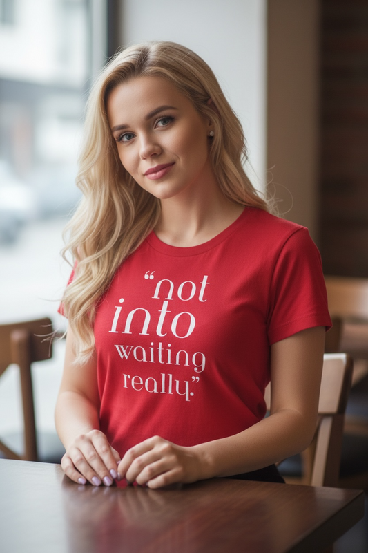 Woman wearing a red t-shirt with text in a casual setting "not into waiting really" by KALMii